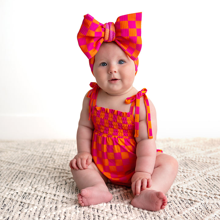 Eric Orange SMOCKED BUBBLE ROMPER - Gigi and Max