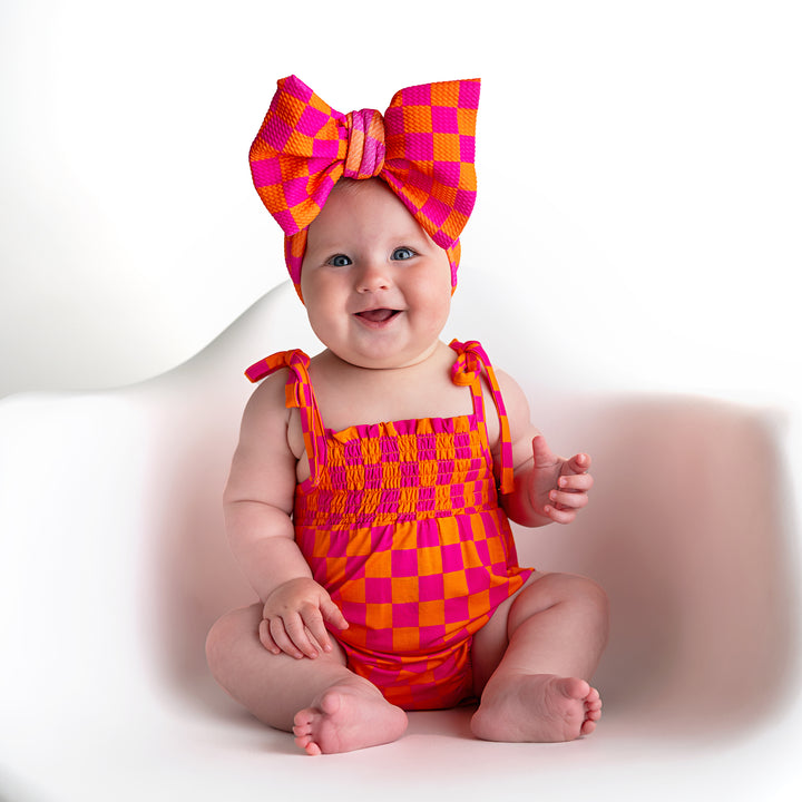 Eric Orange SMOCKED BUBBLE ROMPER - Gigi and Max